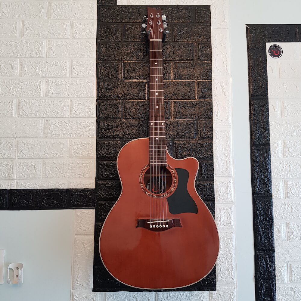 dan guitar acousitc dang khuyet
